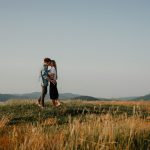 scenic engagement photo session on a hill